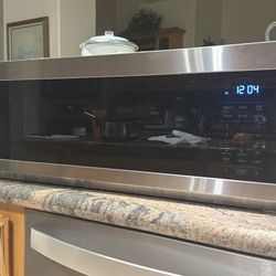 Samsung Smart SLIM 1.1-cu ft Low Profile Over-the-Range Microwave ME11A7510DS