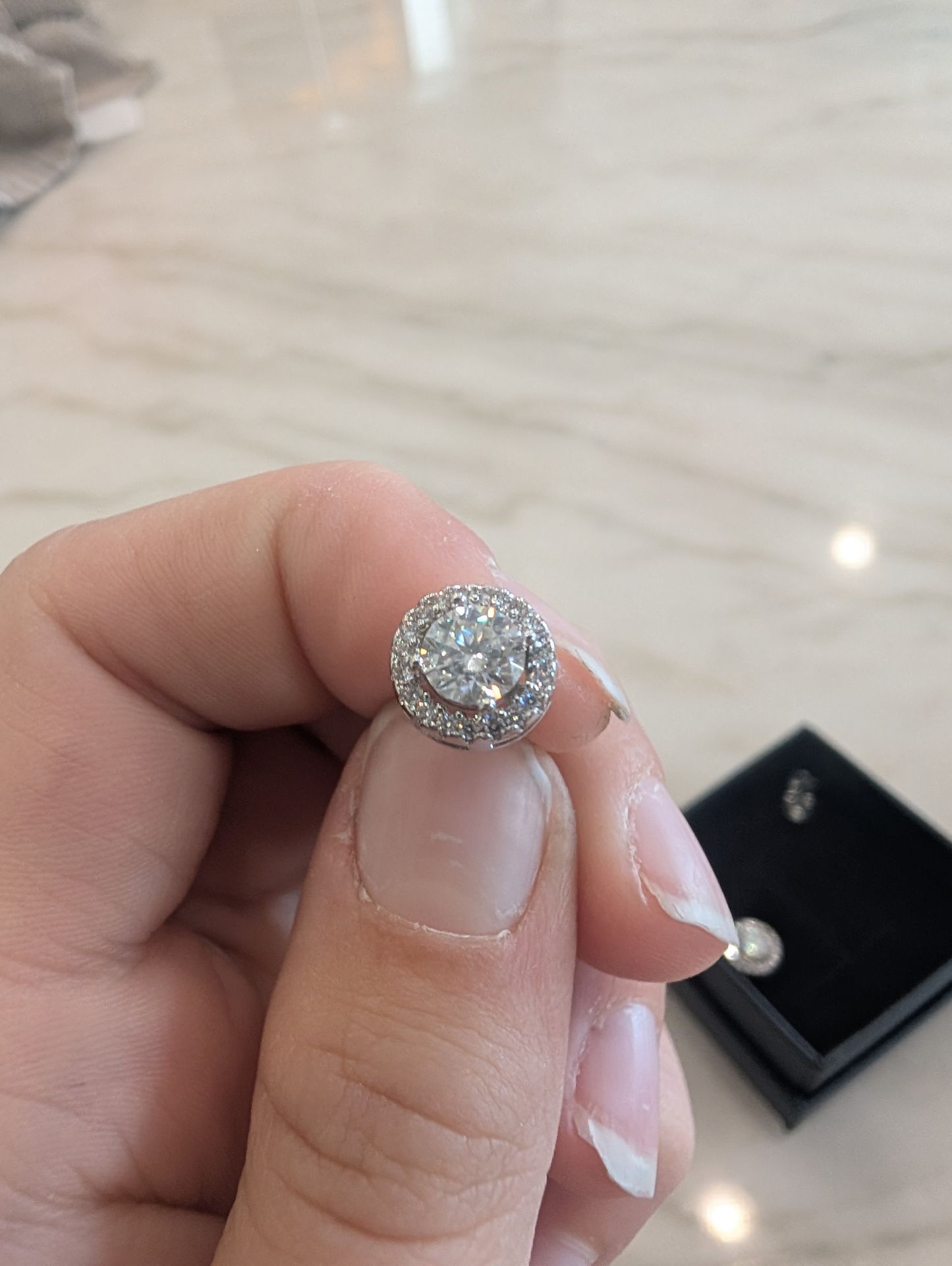 Moissanite 0.5 carats earrings valued at 300. Selling for $200