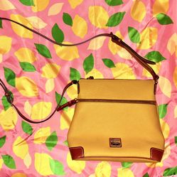 Dooney & Bourke Pebble Grain Crossbody Bag in color Dandelion