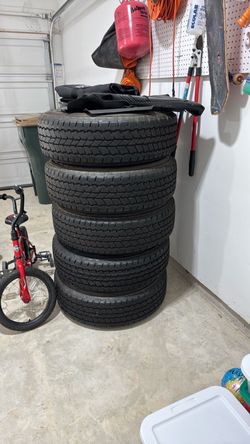 Set of 5 Used Tires for Bronco, floor mats, and roof bag