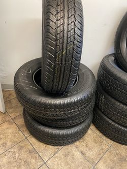 SET DUNLOP 245/75/16 DUNLOP SEMI NEW 95%TREAD LIFE $280 PRICE INCLUDE PROFESSIONAL INSTALLATION AND TAX