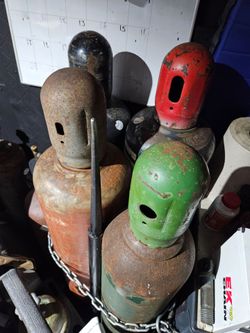 Assorted acetylene tank cylinders