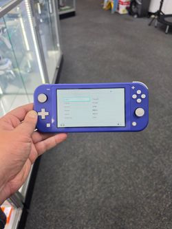 Nintendo Switch Lite with Charger.