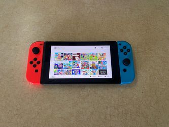 NINTENDO SWITCH with 15 Games Mario Kart,Mario Party,Mario 3D