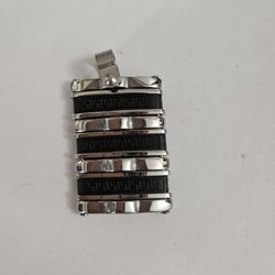 Silver/black rubber unisex pendant with Aztec design, 1". NWT.