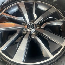 Like new tires with rims