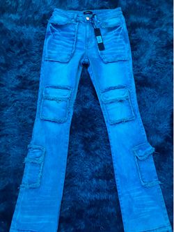 Stacked blue jeans Size M