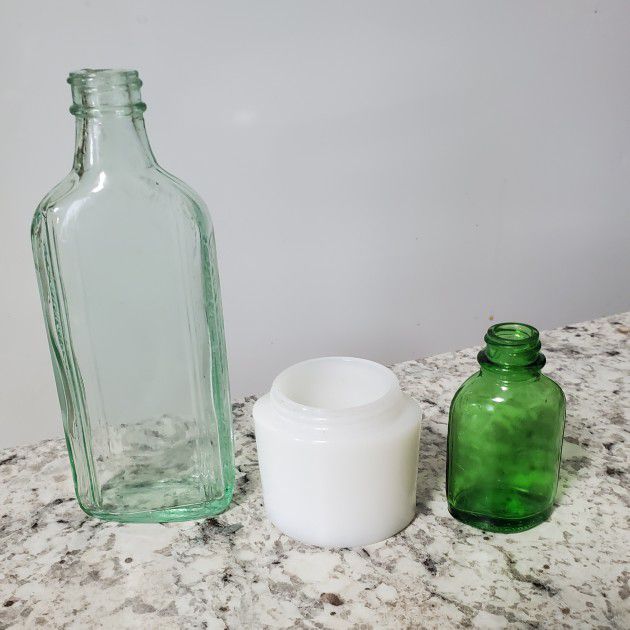 Two Vintage glass bottles & 1 Milk Glass Pond's Jar