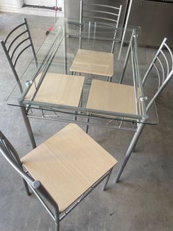 Glass table with chairs