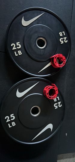 Set of 25lbs Nike rubber bumper plates /2 barbell clips