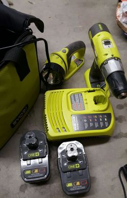 Ryobi cordless drill with cordless flashlight and charger