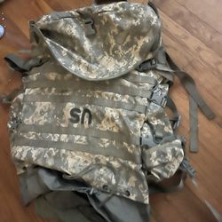 Military boots and backpack