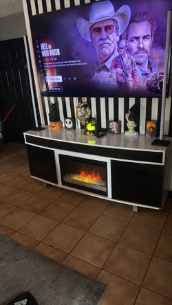 TV stand with built-in fireplace and Bluetooth speakers
