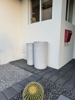 Tall concrete planters pots