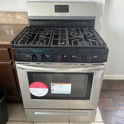 Stainless Steel, Stove And Refrigerator
