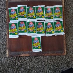 Unopened 1990 Fleer Premier Edition football packs. Vintage sealed 15-card packs for collectors, resellers, and fans of old school football memorabili