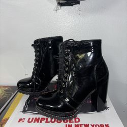 Side zipper and laced heel boots