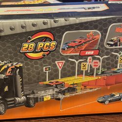 Joyin 28-piece Truck Orbit Racing Transport Truck toy set. 