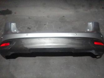 2012-2015 Mazda 5 Back Bumper With All The Accessories And Parking Assistant Sensors Oem.