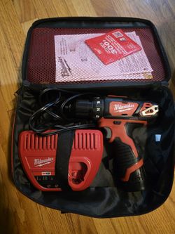 Milwaukee Dril With Kit ( New)