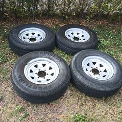 I have three torsion axles and six six lug pattern with Buddy bearings. Also I have a set of four 15-in 6 lug pattern trailer rims and tires that will