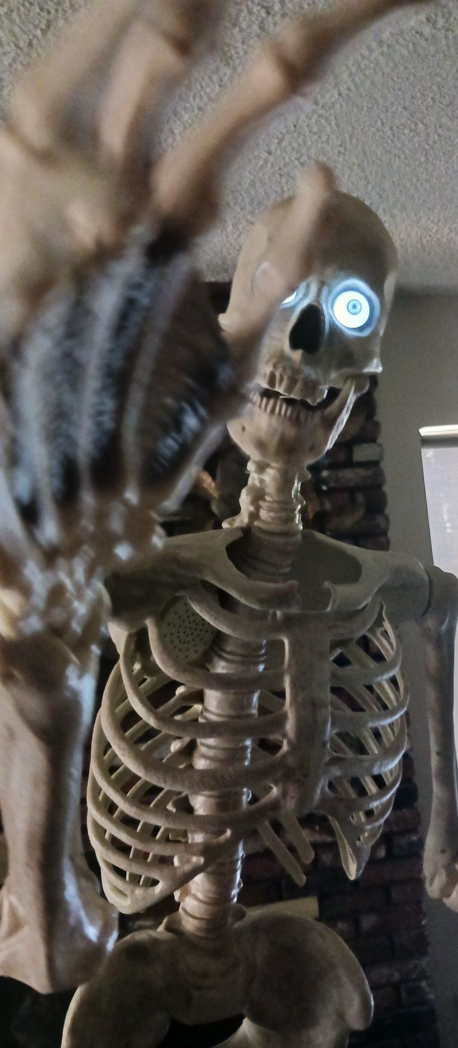 Spirit Halloween 6ft Grim Animatronic Skeleton