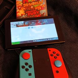 Switch game system with 2 physical games.. and  everything in pictures.. bundle deal