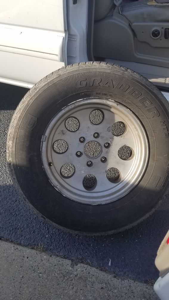 Chevy Wheels with Tires $ 200.00 Or Best Offer