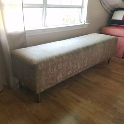 Long upholstered cushioned ottoman bench
