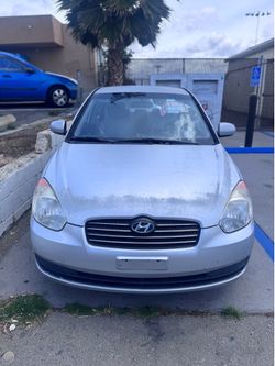 2011 Hyundai accent, silver,4-door