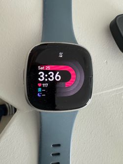 Smartwatch with Charger - Works Perfectly (Minor Crack)