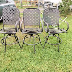 Three Swivel Patio Chairs 