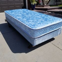 Nice Twin Bed. Mattress Plus Box Spring And Metal Frame
