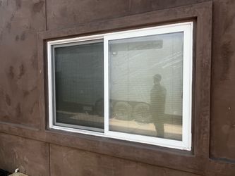 Used White Vinyl Sliding Window