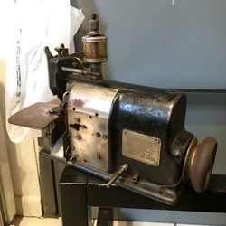 Antique sewing machine with many extras