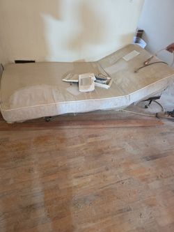 Hospital twin bed tilts up  tilts down