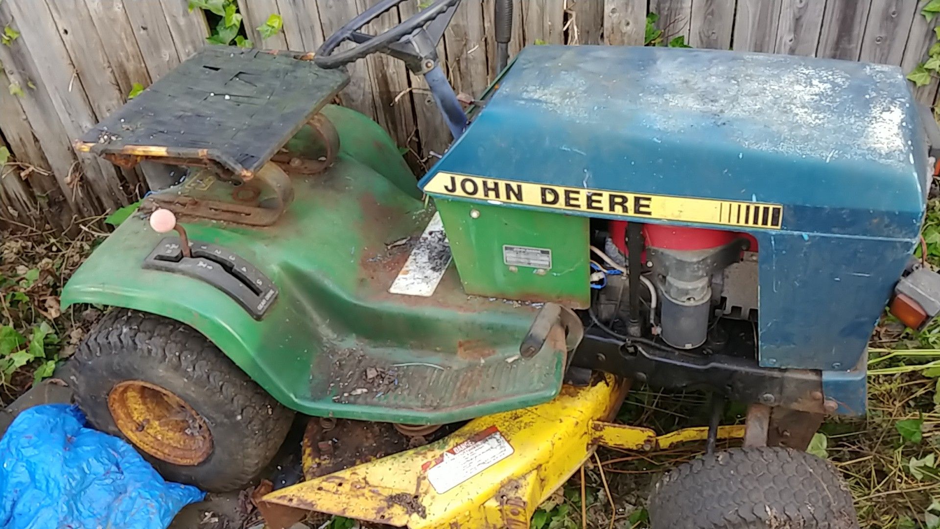 John Deere riding lawn mower