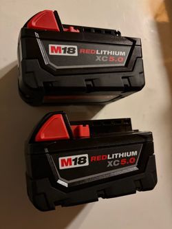 Two Milwaukee M18 Batteries