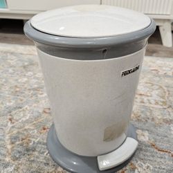 Barely used step on small trash bin. 