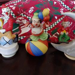 Vintage musical box clown figurines