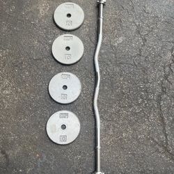 Standard Curl Bar With 40 Lb Of Standard Plates  ( FOUR 10 LB. ) STANDARD PLATES  