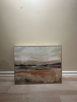 Modern abstract framed wall art with warm neutral tones