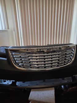 Brand new bumper with grille