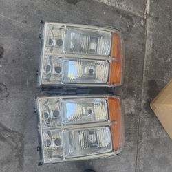 2013 GMC Sierra Headlights