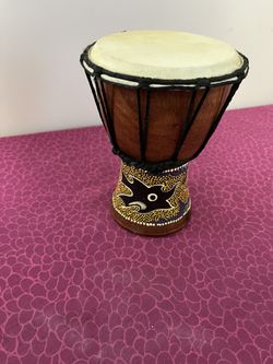 mini djembe drum with a painted gecko design
