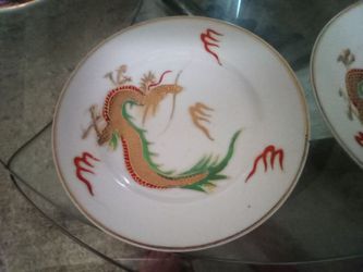 Two fine Japanese dinner plates with 24 karat gold trim hand painted