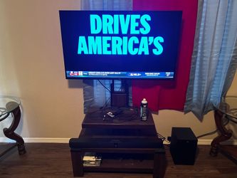 Tv with stand and soundbar with sub