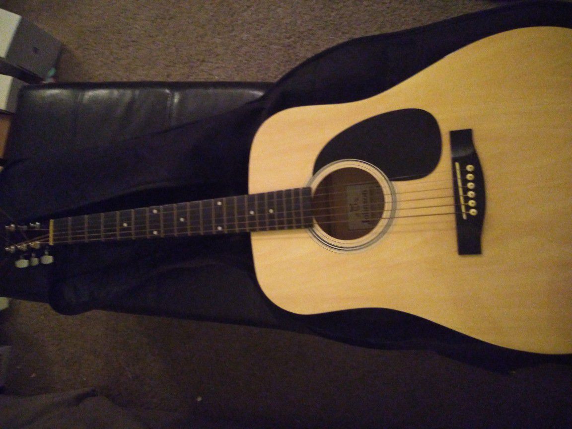 Johnson acoustic guitar