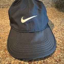 Nike Kids Black Featherlight Dri-fit hat. Adjustable back strap. Fits  Little Kids/Youth. See Below