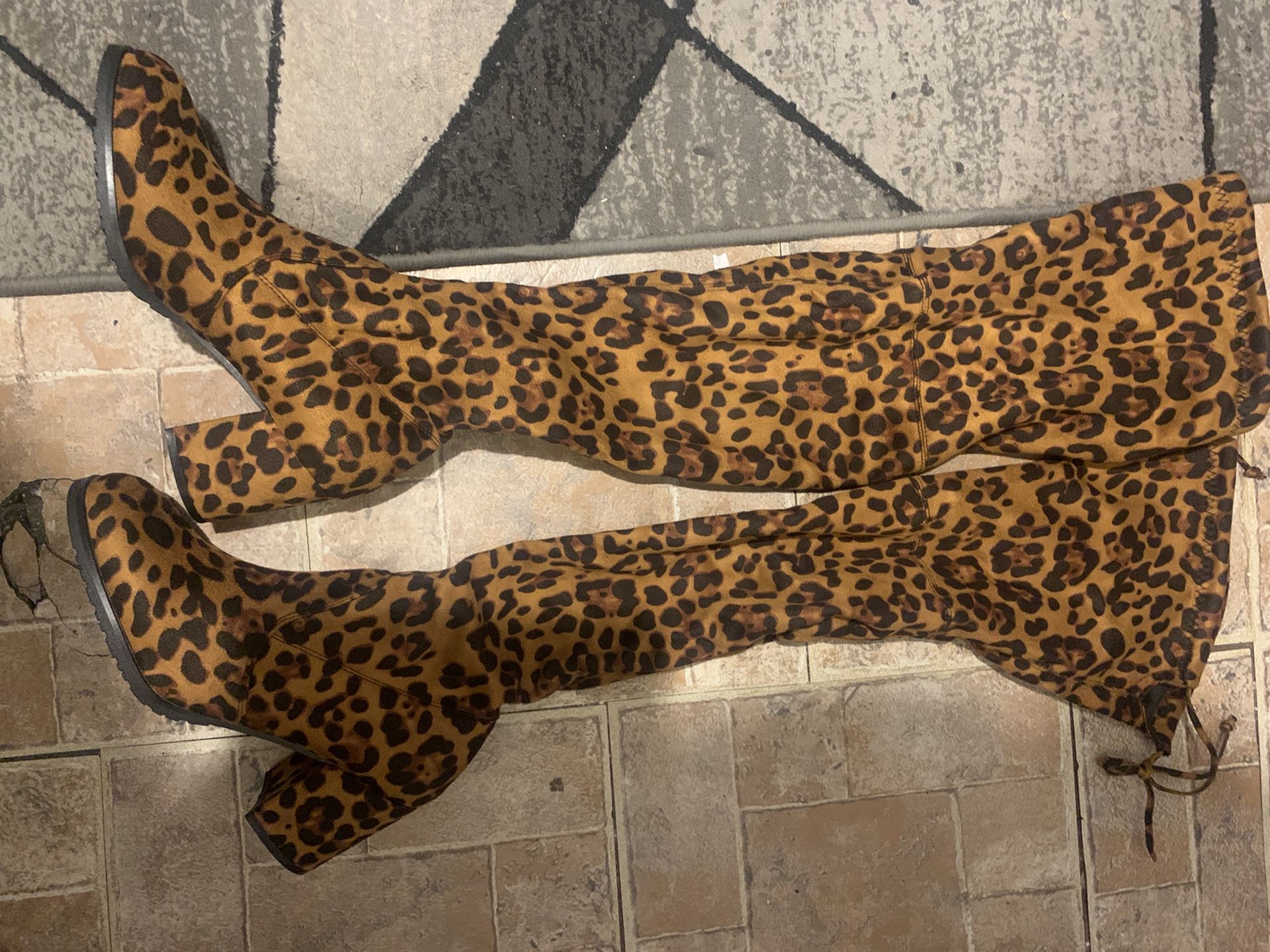 Knee-high leopard boots